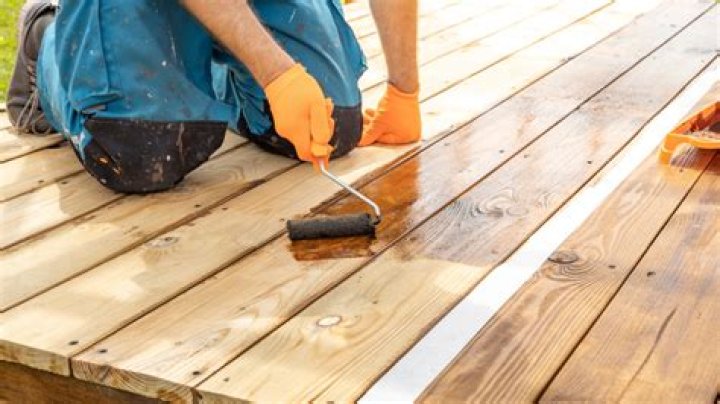 can you stain treated wood
