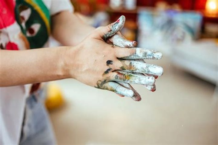 how to get oil based paint off skin